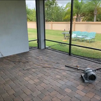 Cleaned and not sealed Back Lanai Pavers drying.webp