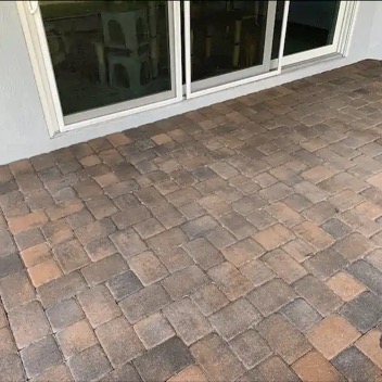 Cleaned and not sealed Back Lanai Pavers.webp